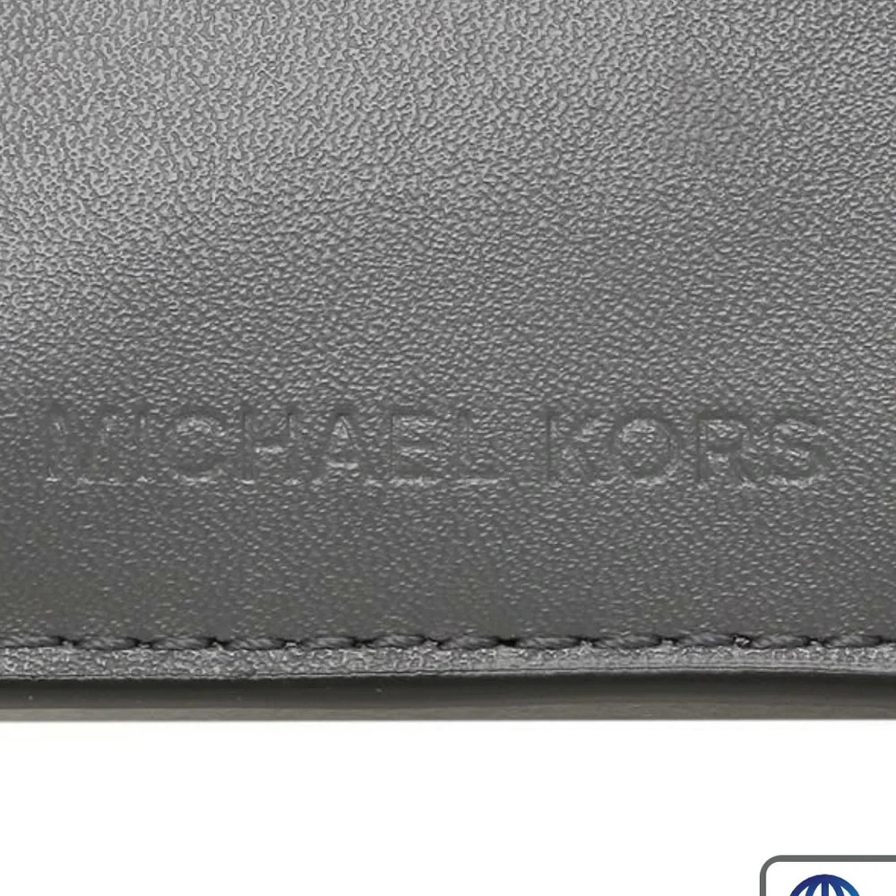 MICHAEL KORS CARMEN MEDIUM FLAP LOGO AND FAUX LEATHER WALLET HEATHER GREY MULTI